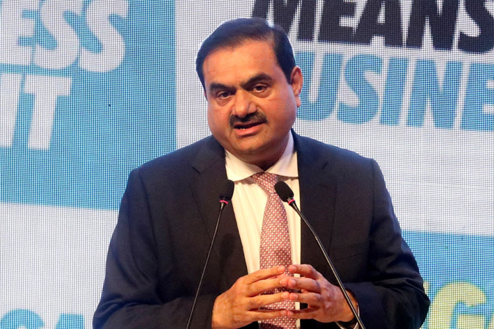 India Regulator Puts Seven Adani Firms on Notice For Violations