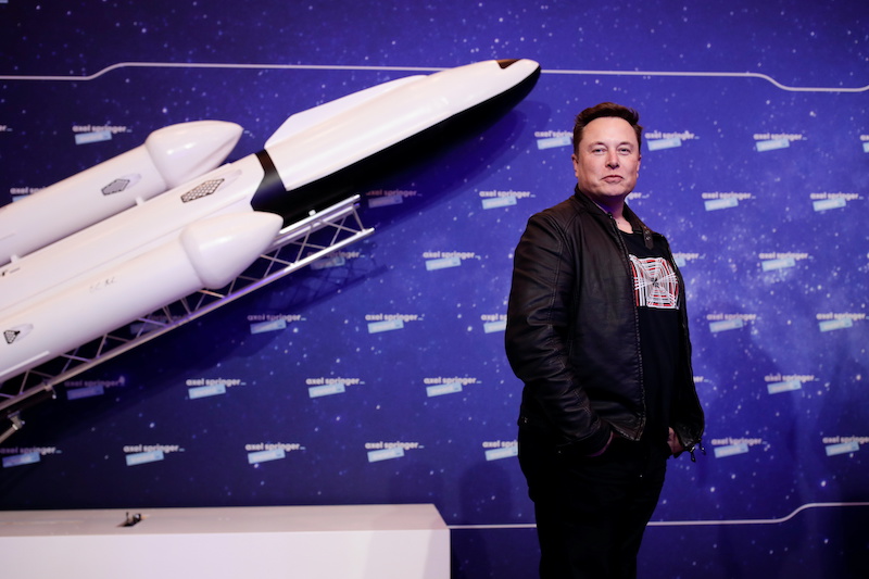 SpaceX owner and Tesla CEO Elon Musk poses after arriving for an award, in Berlin