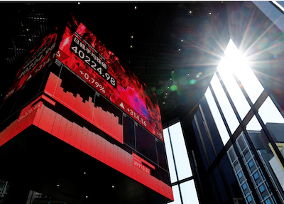 An electronic screen displaying Japan's Nikkei share average is pictured in Tokyo, Japan March 4, 2024. REUTERS/Kim Kyung-Hoon/File Photo Purchase Licensing Rights